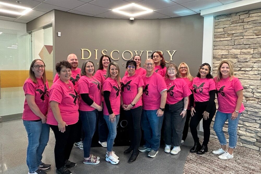 Discovery FCU team in pink shirts