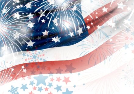 American flag with stars and fireworks